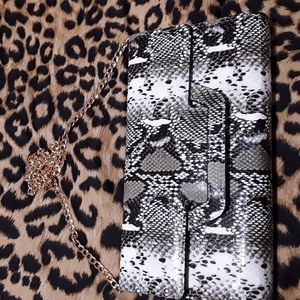 Faux snake print clutch